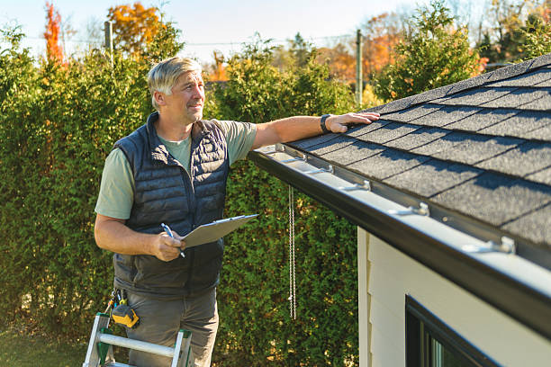Professional Hail Damage Roof Repair technician working in Mendon, UT
